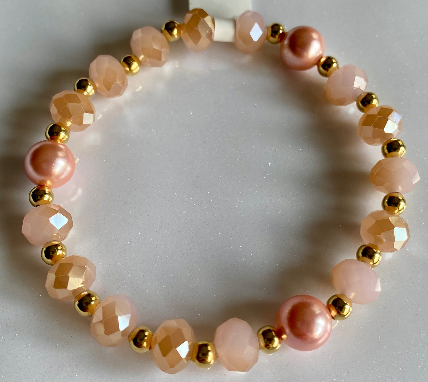 With a Sweet Pink Pearl Beaded Bracelet