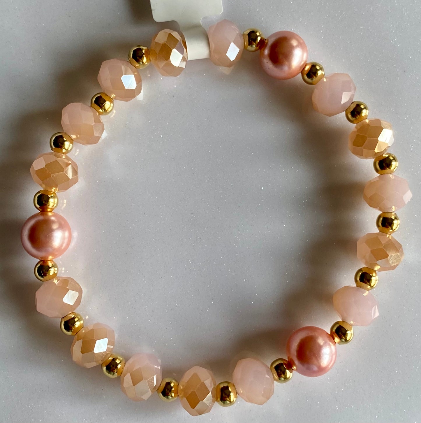With a Sweet Pink Pearl Beaded Bracelet